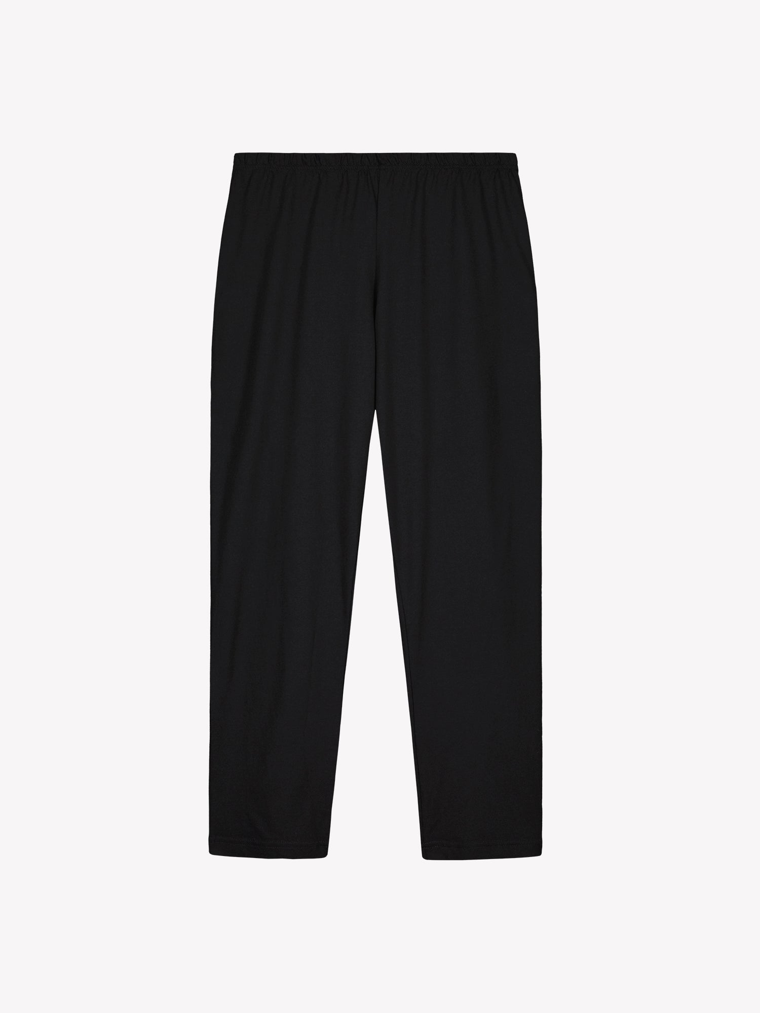 Nanson naisten mukava Fiona-pyjama, jonka paidassa on tyylikäs sinisävyinen kuosi. Hengittävä materiaali ja mukava malli tekevät trikoopyjamasta suosikin rentoon oleiluun. Tuotekuva mustista housuista