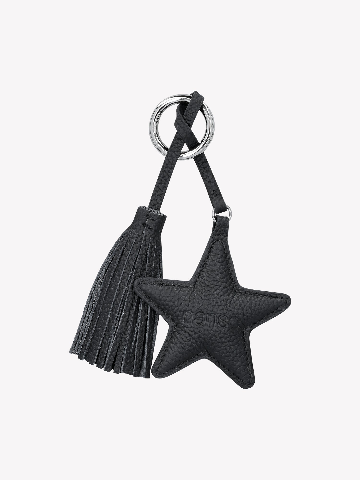 Tuotannon ylijäämänahasta valmistettu ihana musta TUPSU laukkukoriste, joka toimii sekä avaimenperänä että laukkukoristeena.