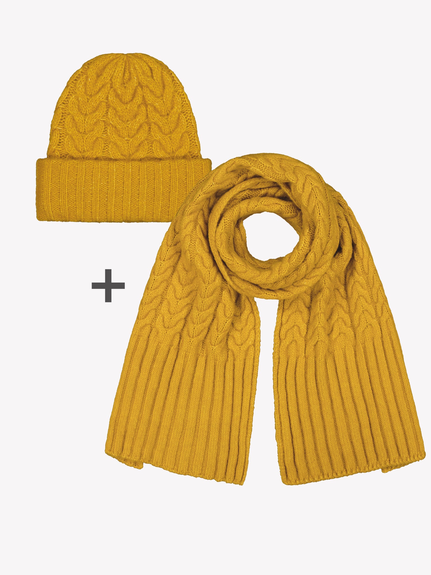 Naisten muhkea keltainen Kierre-asustesetti sisältää kaulahuivin ja pipon. Tämä ihana setti varmasti lämmittää mieltä ja kehoa talvella -sopii siis mainiosti vaikka lahjaksi. kuva setistä