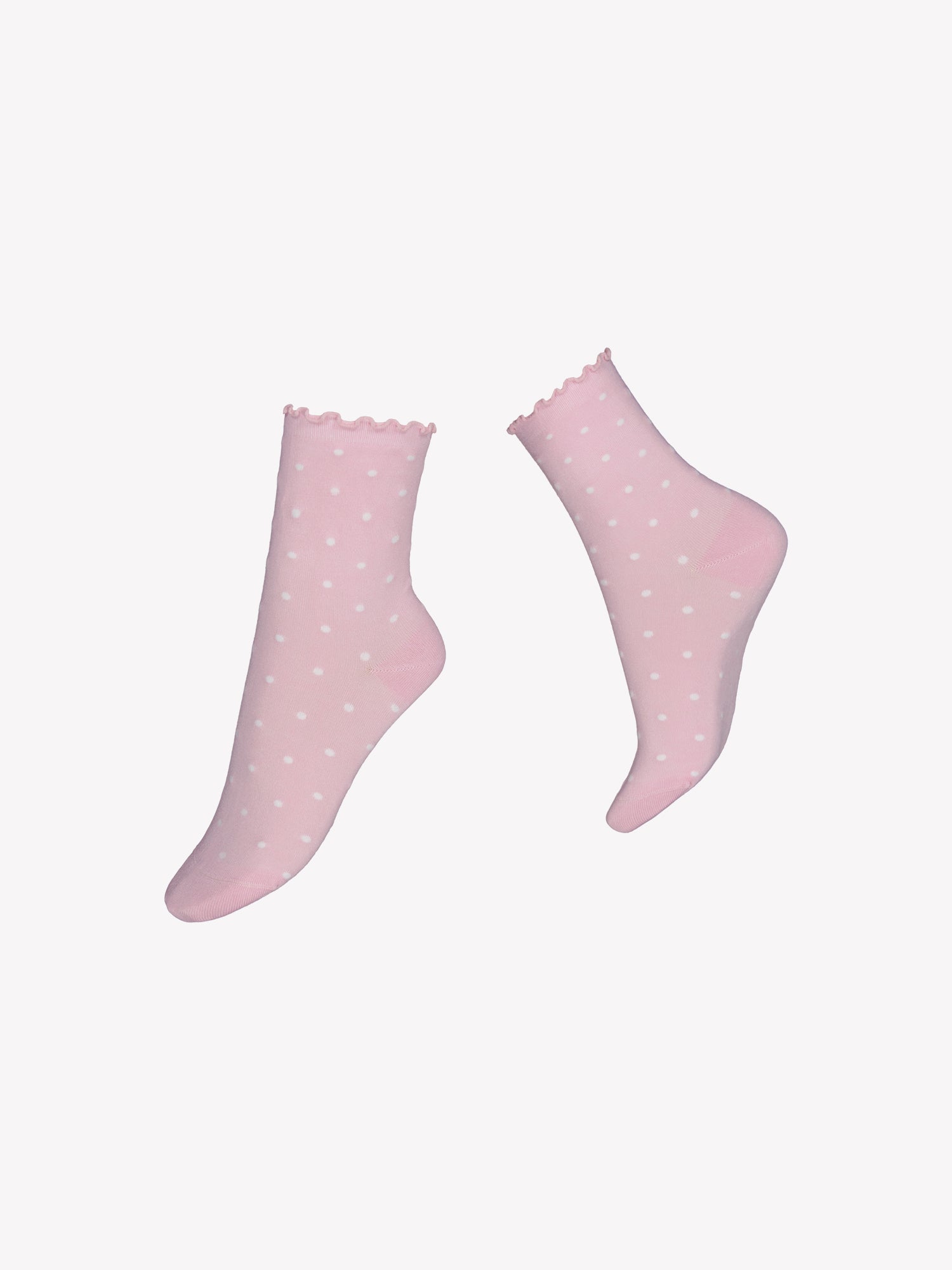 Voguen pehmeät vaaleanpunaiset bambuviskoosisukat tuntuvat mukaville ja hengittäville jaloissa. Sukissa on pieni pilkkukuviointi sekä kaunis frillareunus.