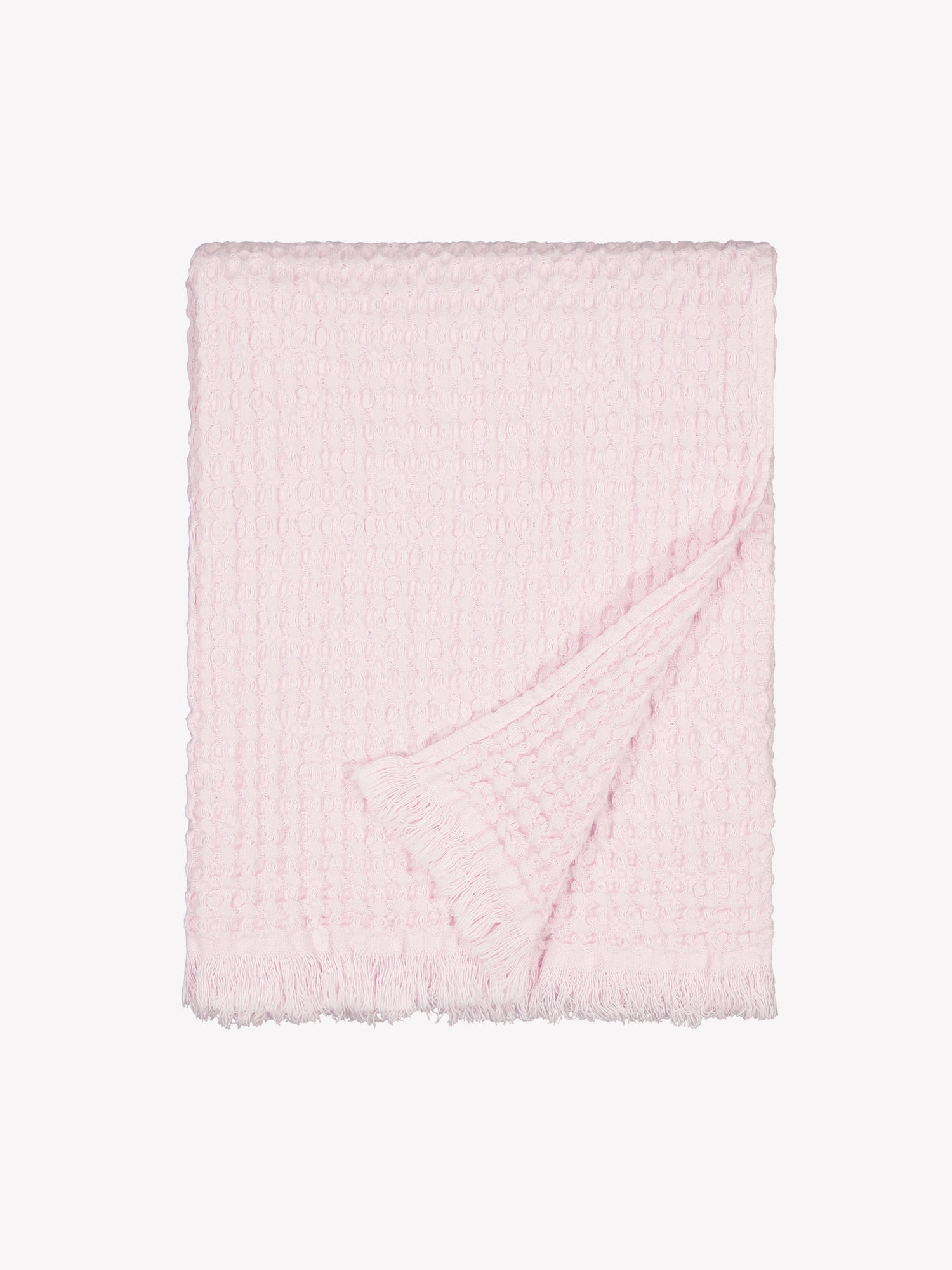 Nanson vaaleanpunainen Vohveli-kylpypyyhe tuotekuvassa viikattuna