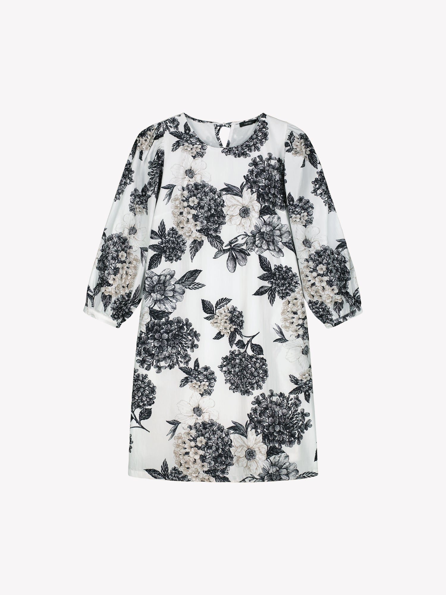 Naisten hurmaava mustavalkoinen kuosillinen Palatsi-mekko tuotekuvassa.