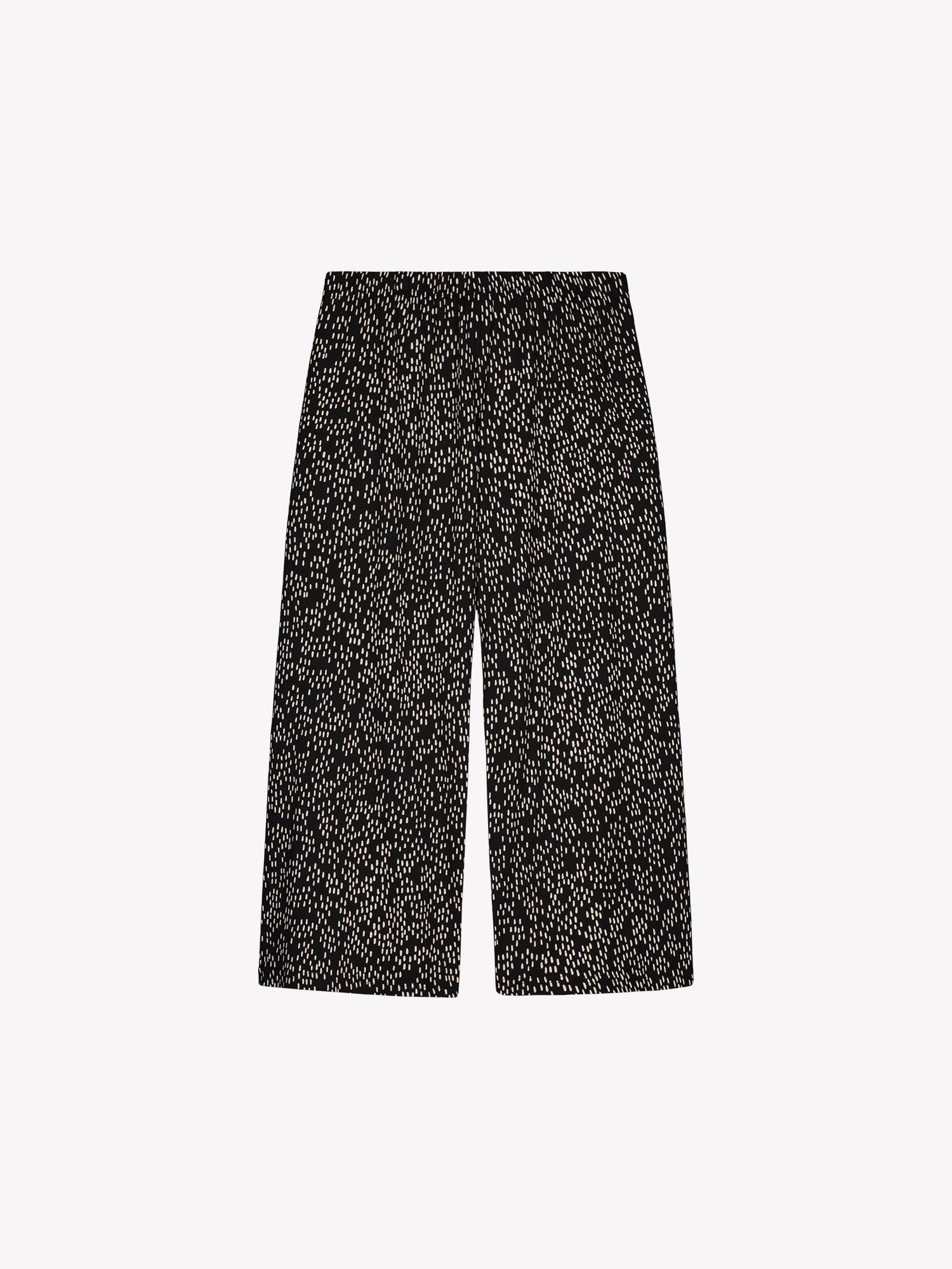 Nanson naisten mukavat leveälahkeiset Pilkkumeri-trikoohousut, joissa on tyylikäs kaksisävyinen kuosi tuotekuvassa.