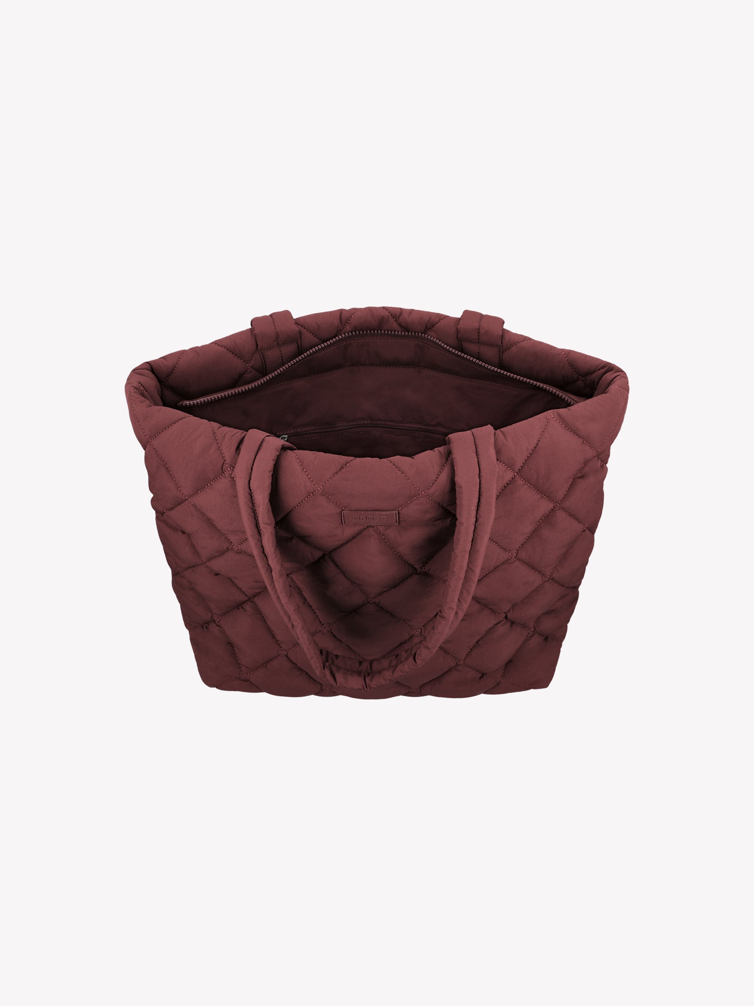 Nanson trendikäs tikkikankaasta valmistettu iso viininpunainen Maxi Vanu-totebag laukku tuotekuvassa yläviistosta.