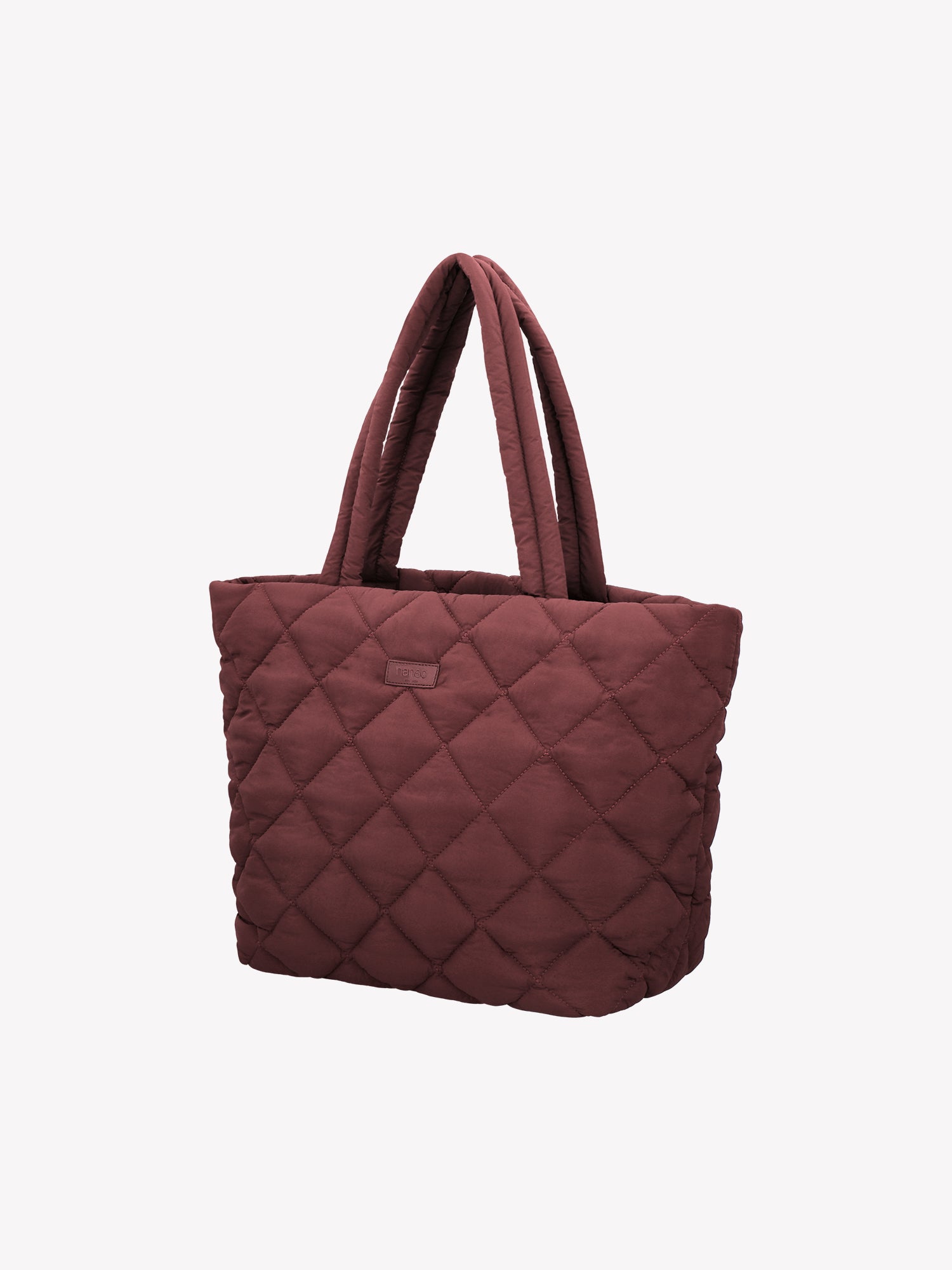 Nanson trendikäs tikkikankaasta valmistettu iso viininpunainen Maxi Vanu-totebag laukku tuotekuvassa edestä viistosti sivusta