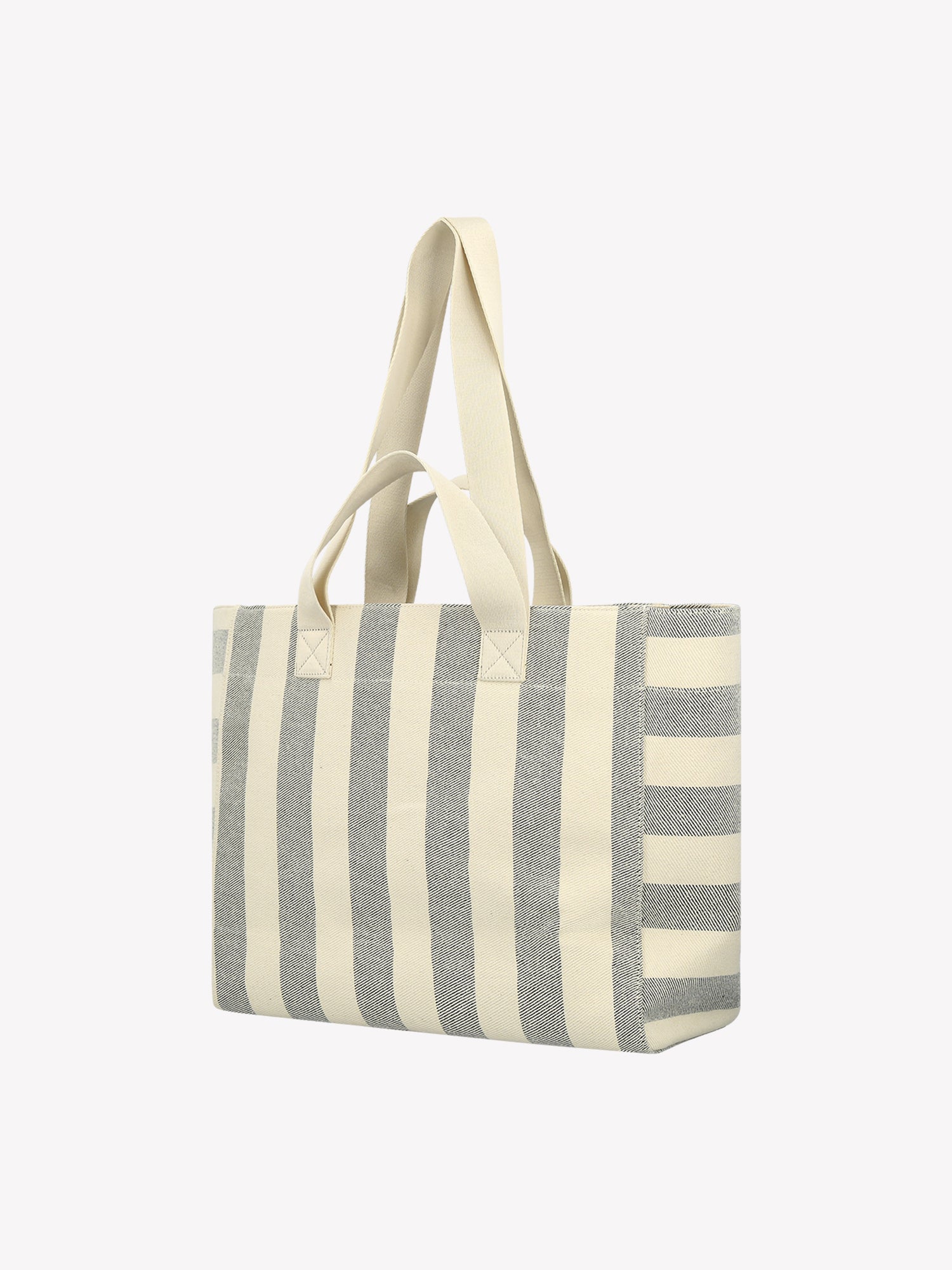 Nanson raidallinen mustavalkoinen Amalfi Beach-laukku tuotekuvassa takaa päin.